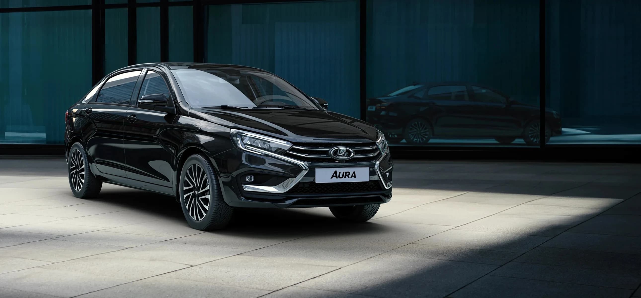 LADA Aura — вид сбоку, чёрный седан